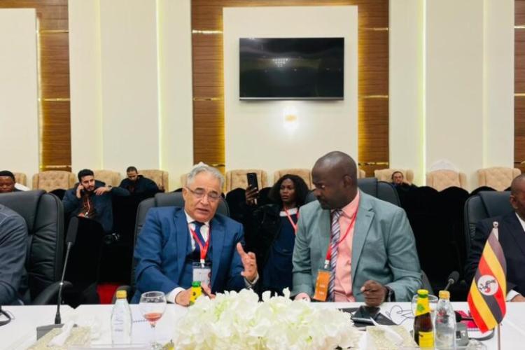 Secretary General with the Tunisia representative at the African Migration Conference