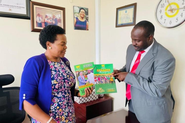  The secretary General with Mrs Kawuma Irene at her Office